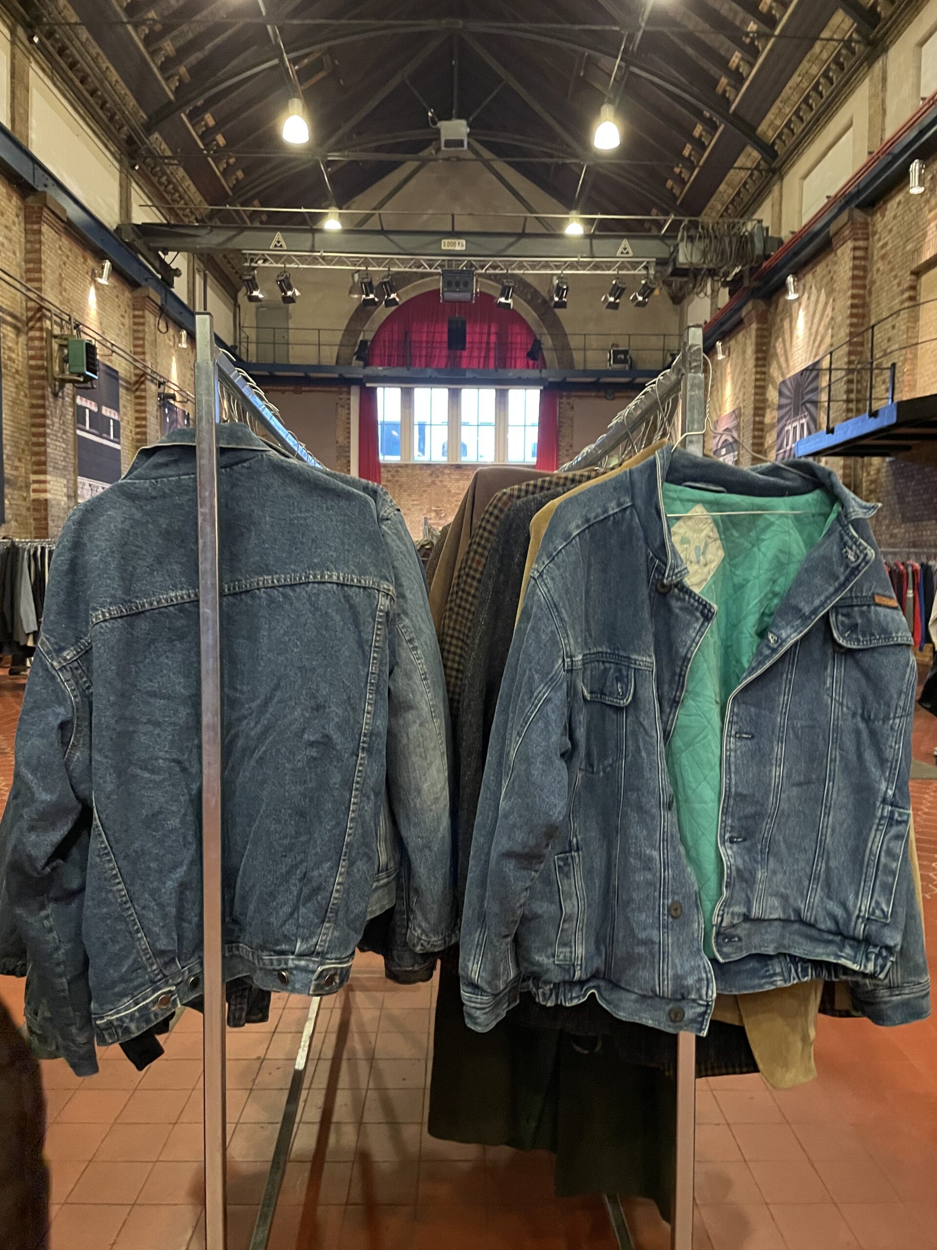 Two jackets at a vintage market.